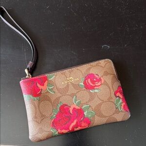 Coach Brown Wristlet with Red Floral Design